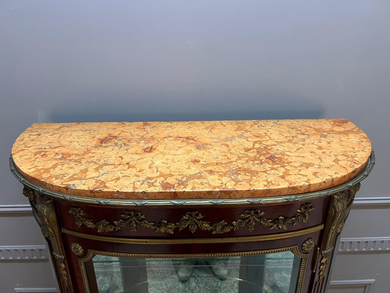 Louis XVI style display cabinet, signed Les fils d’Alfred Wimphen