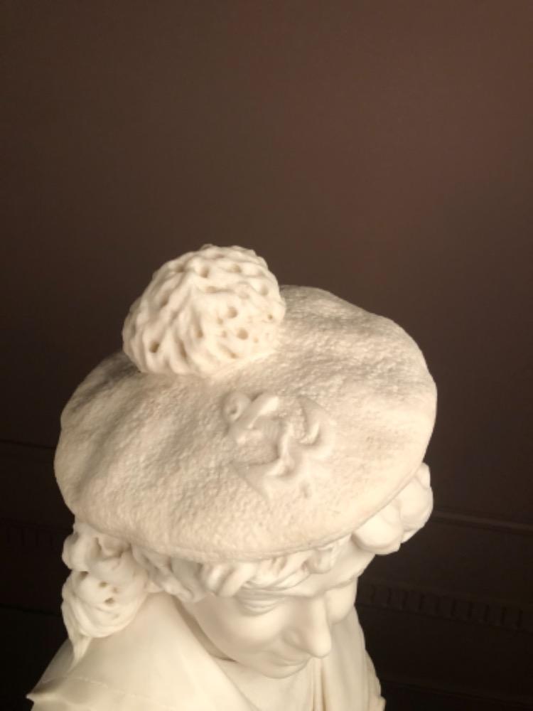 Marble bust of a young sailor signed and dated