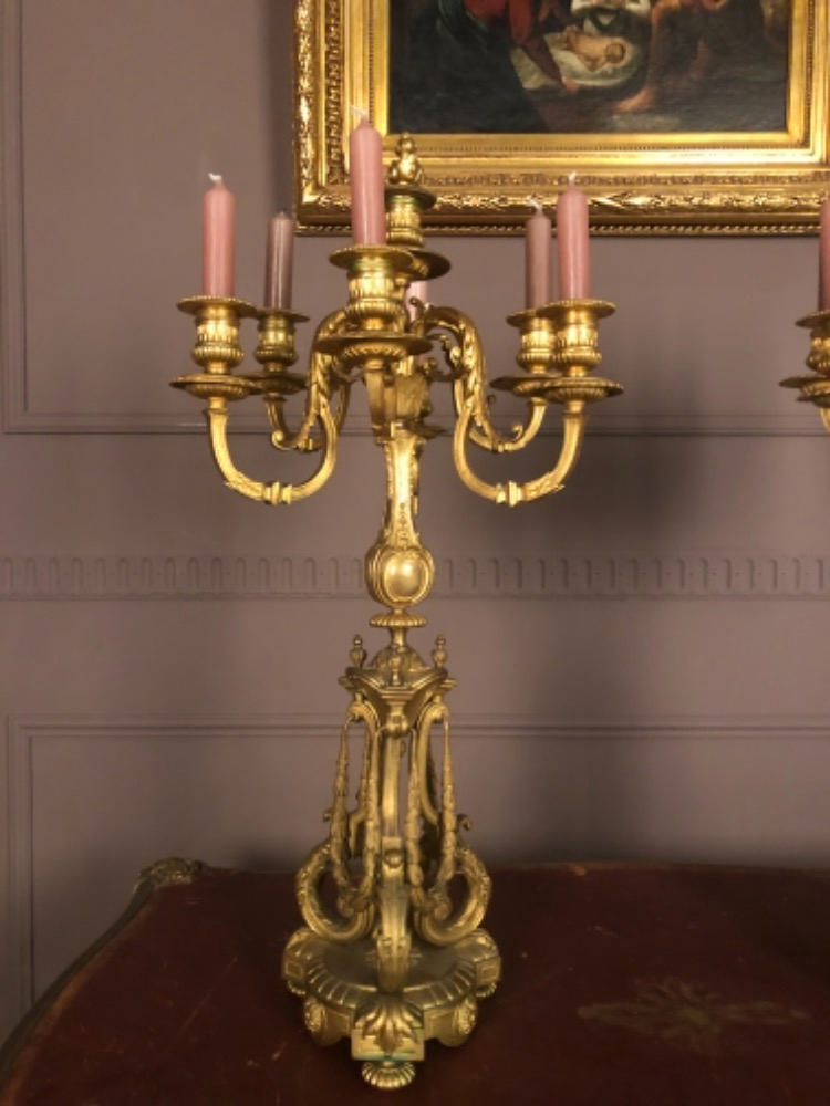 Pair of gilded bronze candelabres