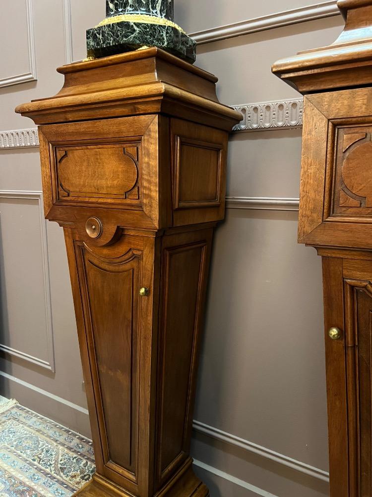 Paire of walnut columns