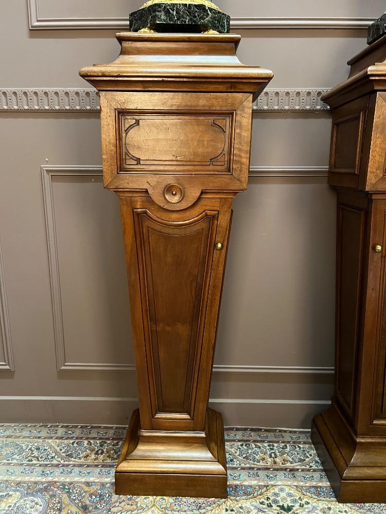 Paire of walnut columns